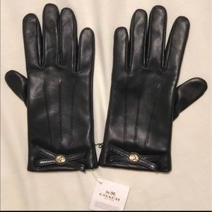 Coach woman’s Black Leather gloves.